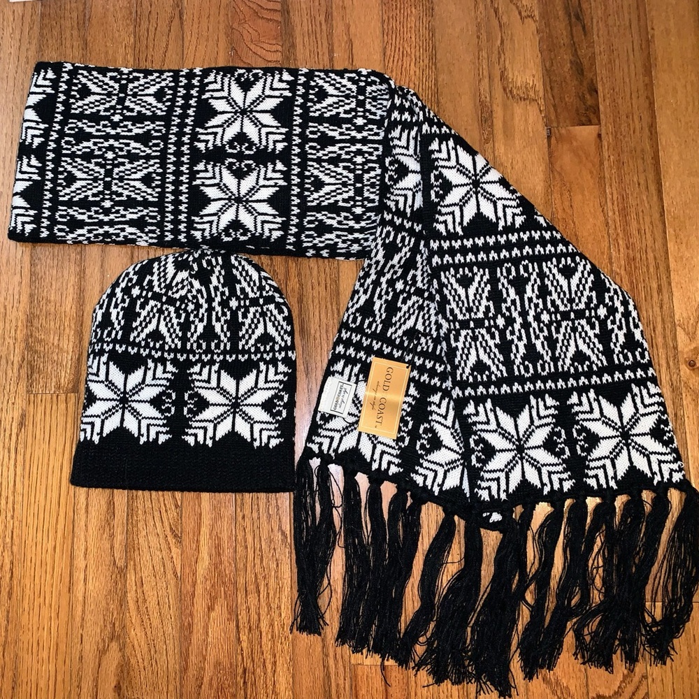 Ladies One size New with tags thick knit well made scarf and hat. Black white.